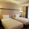 Отель Pullman Qingdao Ziyue в Циндао