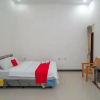 Отель RedDoorz Syariah Near Syamsudin Noor Airport 4, фото 5