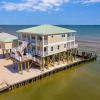 Отель Shamrock Shores Bottom Floor - Large gulf front deck and a private sea wall for fishing! Rent as a 4, фото 19
