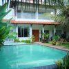 Отель Villa Prambanan Jogja with Private Swimming Pool by Simply Homy в Слемане
