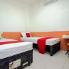 Отель RedDoorz near Jalan Jendral Sudirman Manado, фото 12
