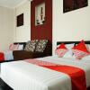 Отель OYO 2860 The Castury Homestay Syariah, фото 3
