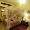 Отель Remarkable 2-bed Cottage Along Gayaza Road, фото 4