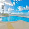 Отель Deja Blue - Comfortable Beachfront condo, фото 7