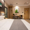 Отель UP and IN Hotel Zhengzhou Erqi District Hanghai West Road Qiliyan Metro Station, фото 1