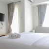 Отель Cozy Living Studio Room At Urbantown Serpong Apartment, фото 5