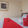 Отель Urbanview Hotel Mon Bel Cibodas by RedDoorz, фото 15