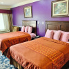 Отель Scottish Inns & Suites, фото 4
