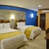 Отель Hacienda Inn Aeropuerto, фото 8