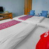 Отель Super OYO 90072 Apri Inn Syariah, фото 5