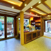 Отель Lijiang Xinyuan Fudi Inn, фото 5