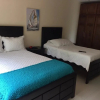 Отель Lujosa Villa Familiar Cerca del Oceano, фото 4
