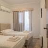 Отель Charmy 2BD Apartment near Mon Repos Beach, фото 16