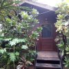 Отель Pele's Windsong Wood Cottage on the beach, фото 17