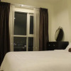 Отель Highrise Cityview Aspire Condo Gym Pool, фото 4