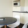 Отель City Edge Serviced Apartments - East Melbourne, фото 3