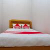 Отель OYO 3060 Al Fatih Guest House Syariah, фото 6