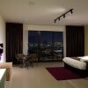Отель Euzmo Residences at Trefoil, фото 3