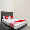 Отель OYO 90785 Mutiara Guest House, фото 23