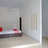 Отель Griya Dimas Residence by OYO Rooms, фото 19