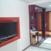 Отель Dongzhiyuan Business Hotel, фото 4