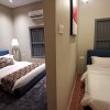 Отель Capital O 90443 Aigoh Hotel, фото 37