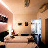 Отель Caroline Rooms Rome, фото 3