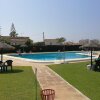 Отель Holidays2Torremolinos Apartamento de 3 dormitorios con terraza y piscina comunitaria в Торремолиносе
