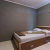 Отель Fatimah Guest House Syariah RedPartner, фото 3