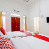 Отель Guest House 513 Syariah By OYO, фото 20