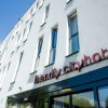 Отель Friendly City Hotel Oktopus в Зигбурге