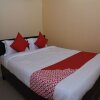 Отель OYO 15071 Hotel Harsh Raj Residency, фото 12
