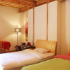 Отель Lijiang Hefenghut Inn, фото 3