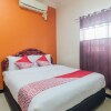 Отель Satria Guest House by OYO Rooms в Амбоне