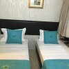 Отель Econ Inn @ Beach Road, фото 4