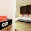 Отель ZenRooms Pluit PIK, фото 3