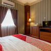 Отель Super OYO Capital O 293 Mutiara Hijau Suites Syariah, фото 7