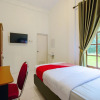 Отель Rumah Mumu Kost & Homestay by OYO Rooms, фото 3
