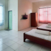 Отель OYO 90226 Penginapan Sederhana Syariah, фото 12