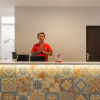 Отель Super OYO Collection O 90023 Damar Kusumo Guest House, фото 14