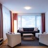 Отель TITLIS Resort Wohnung 213 в Энгельберге