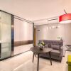 Отель Fu Qian Ming Tai Service Apartment, фото 2