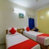 Отель OYO 15415 Hotel Ample Inn Vidyanagar, фото 6