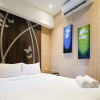 Отель Good Location And Comfy 2Br At Tamansari Papilio Apartment, фото 13