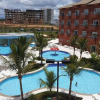 Отель Frente ao Parque da Lagoa Quente, Apto particular com varanda e vista piscinas, com tela de proteção, фото 19