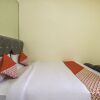 Отель OYO Flagship 1779 Syahransah Guest House, фото 12