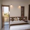 Отель OYO 13273 Home Luxury Stay Airport Road, фото 15