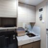 Отель Comfortable And Modern 1Br Without Living Room At Amartha View Apartment, фото 3