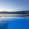 Отель Beachfront Villa Poseidon with Heated Pool, фото 10