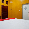 Отель RedDoorz @ Hotel Bravo Pantai Kamali Bau Bau, фото 15